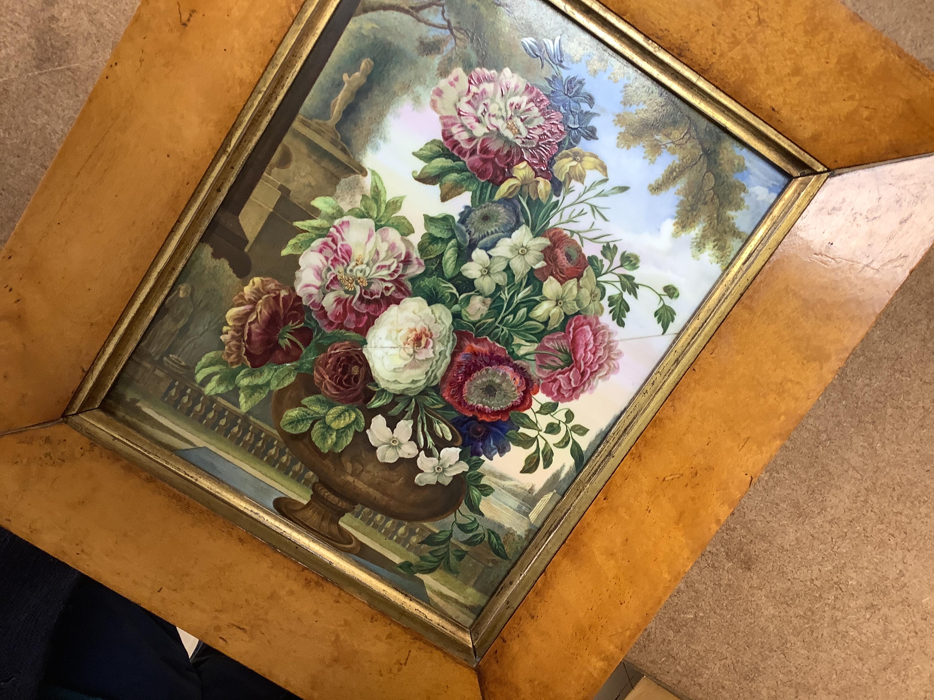 A pair of large English porcelain plaques, painted with flowers in urns, c.1830, maple framed (one cracked), 23cm x 18cm excluding frames